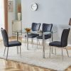 Table and chair set. 1 table and 4 black chairs. The thickness of the glass dining table top is 0.3 feet, with silver metal legs. Black PU leather bac